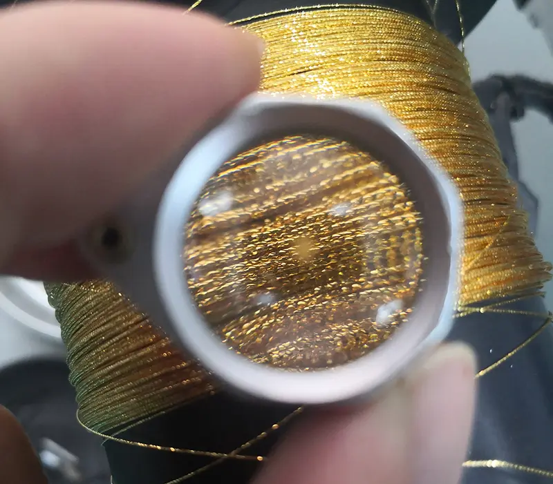 Gold wire processed using a diamond cutting machine for wire and tube.