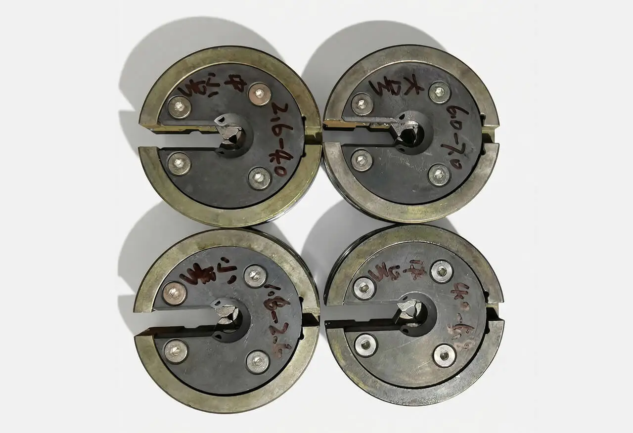 Operator using bangle mirror finish machine in jewelry workshop