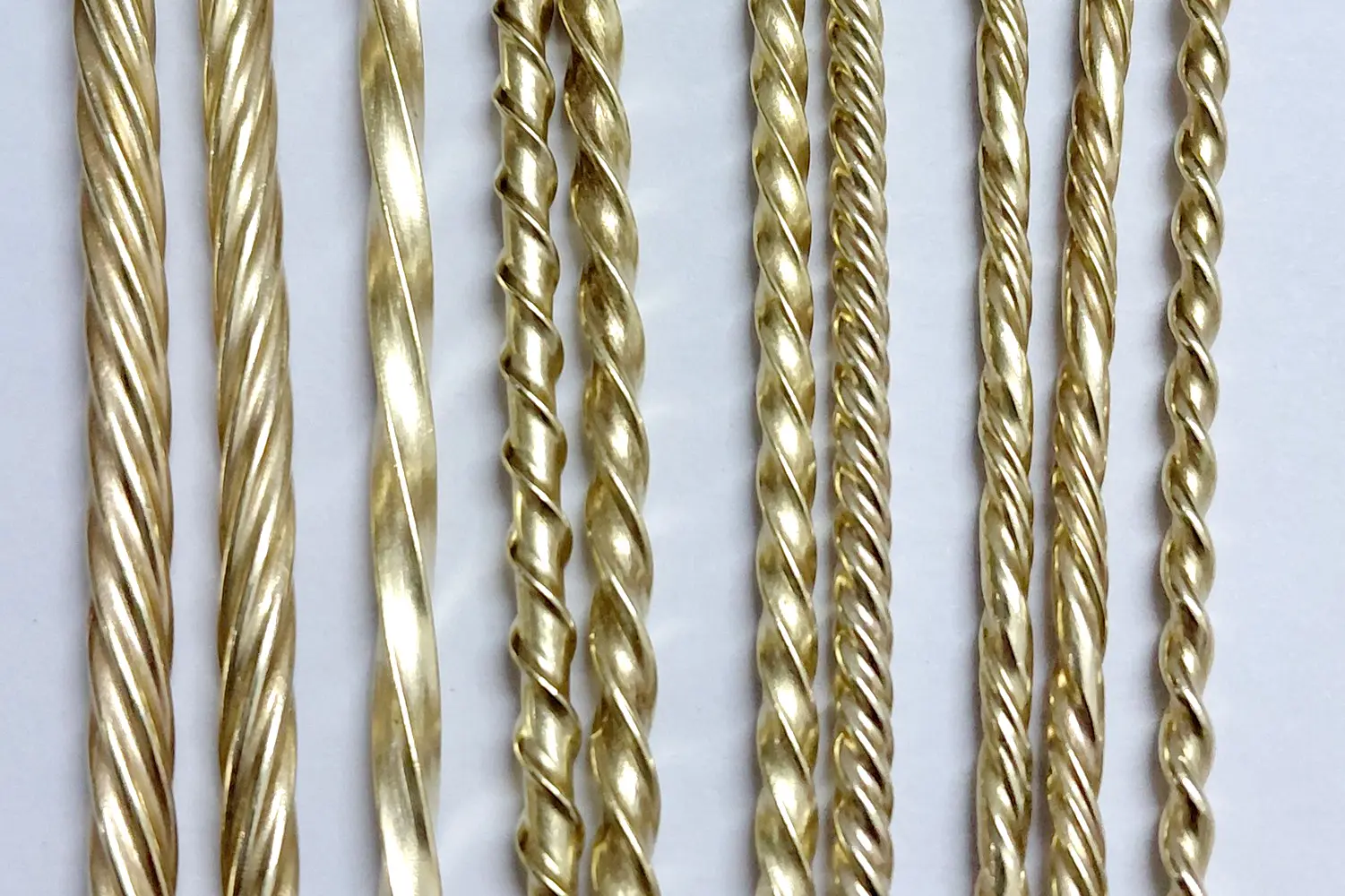 Assorted wire drawing dies for square, flat, triangle, hexagon, and octagon shaped wire profiles